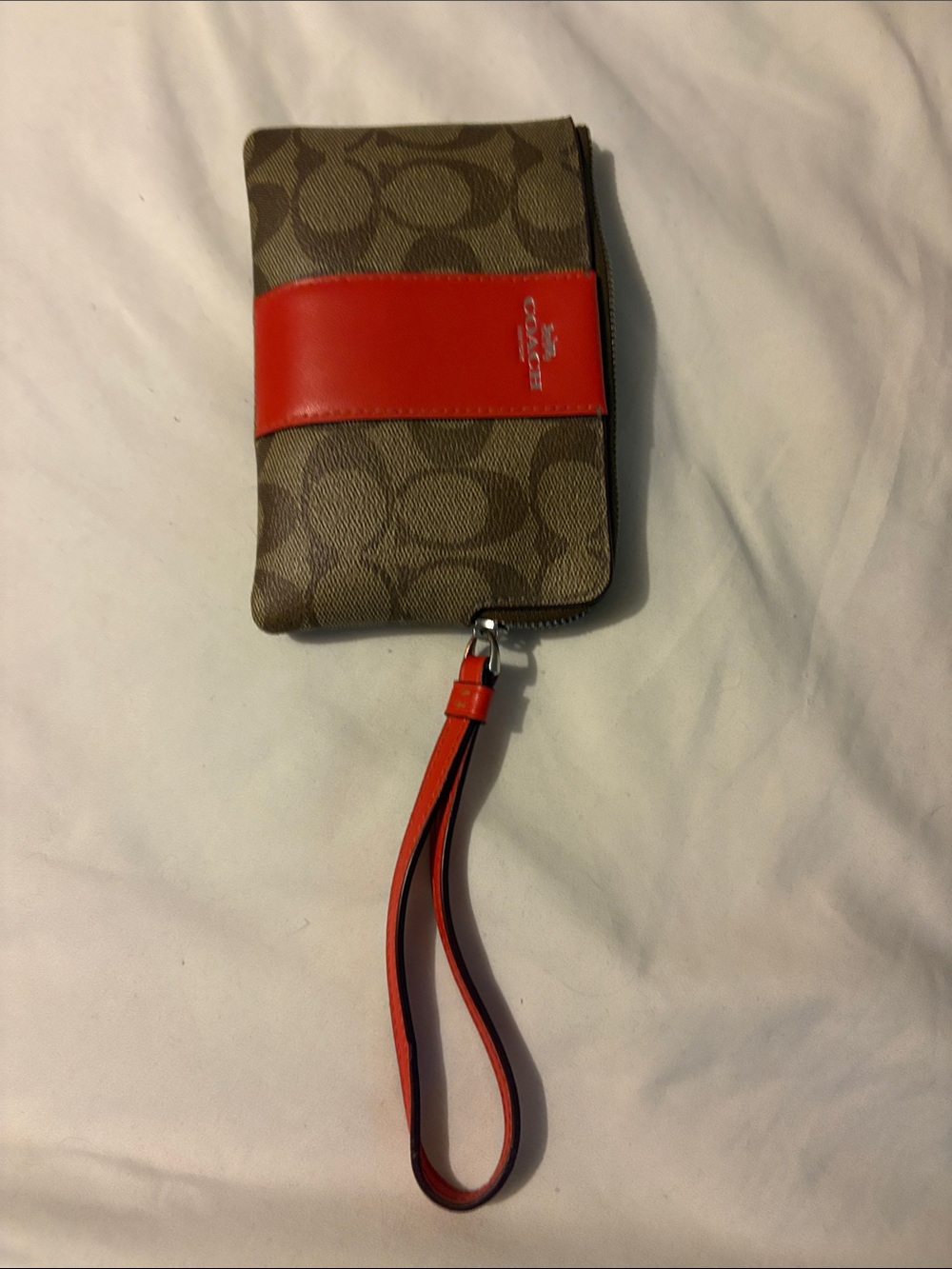 Coach Brown Signature Canvas Wristlet with Red Accent Strap